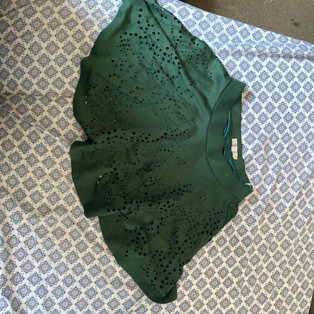 Green upper thigh length skirt